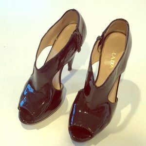 Prada cutout patent pumps